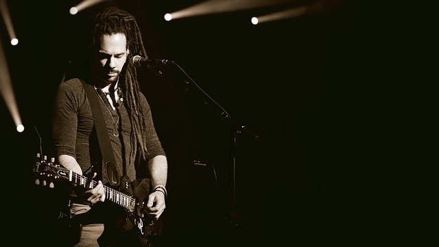 man playing guitar