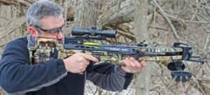 man using a crossbow
