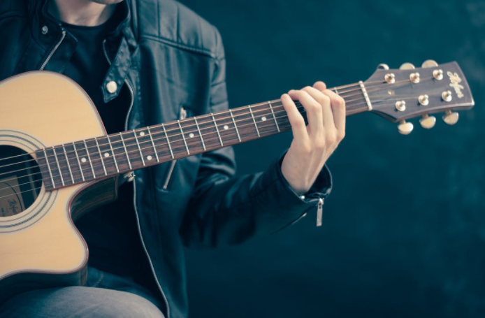 playing a guitar
